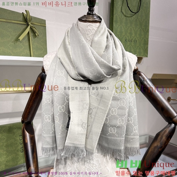 # ÷/ī GG6637238-2